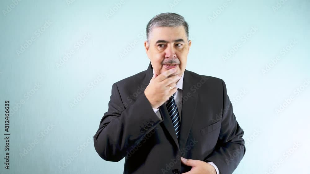 A man in a suit appears highly distressed and uncertain about his next steps A man in a suit appears highly distressed and uncertain about his next steps