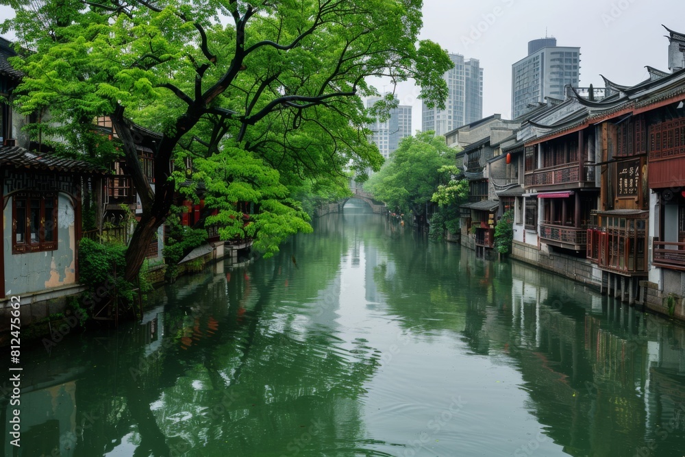 A peaceful river winding through the heart of the waking city A peaceful river winding through the heart of the waking city