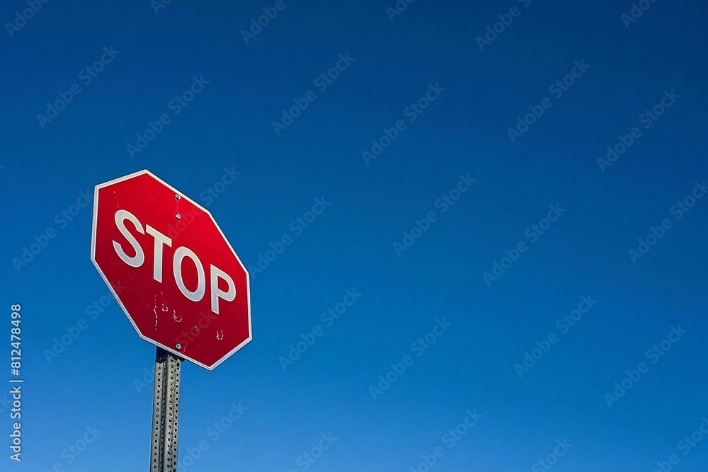 Eye-catching Stop Sign Standing Alone on a Clear Background Eye-catching Stop Sign Standing Alone on a Clear Background