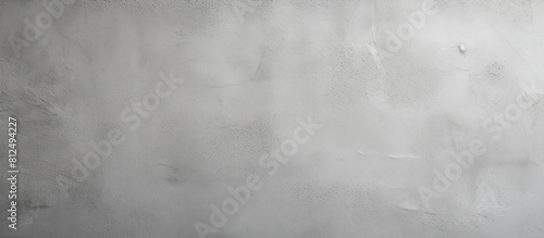 A high resolution image showcasing a textured grey paper background with ample copy space photo