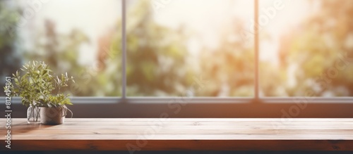 A background image with a blurred window and a table in the foreground providing space for copy. Creative banner. Copyspace image
