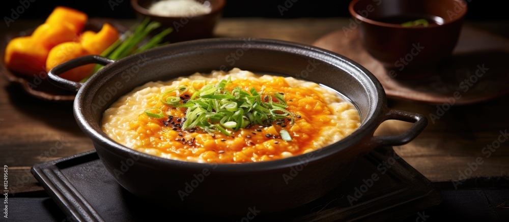 A copy space image of a delicious Korean dish called pumpkin congee A copy space image of a delicious Korean dish called pumpkin congee