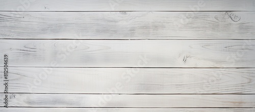 A background with a texture resembling white wood plank providing ample space for incorporating images or text