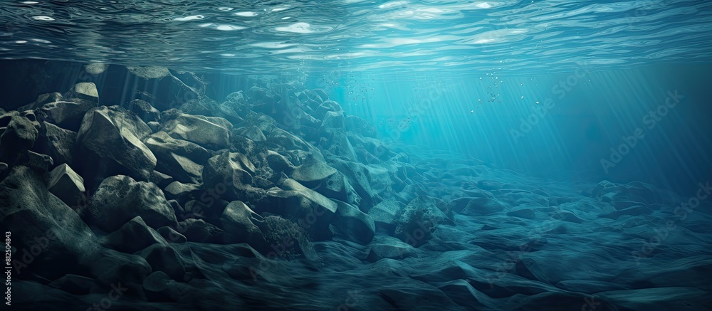 Underwater rocks create an abstract water texture in this image providing ample copy space Underwater rocks create an abstract water texture in this image providing ample copy space