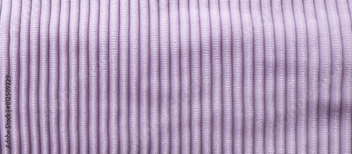 A textured background with a pastel purple corduroy textile perfect for using as a copy space image photo