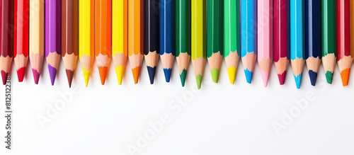 A vibrant array of wax crayons arranged on a white background seen from a captivating perspective with ample space for copying Each crayon is labeled with its respective color name