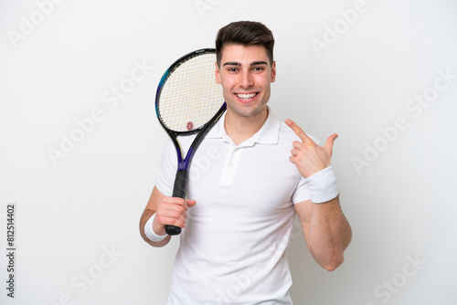 young tennis player man isolated on white background giving a thumbs up gesture © luismolinero