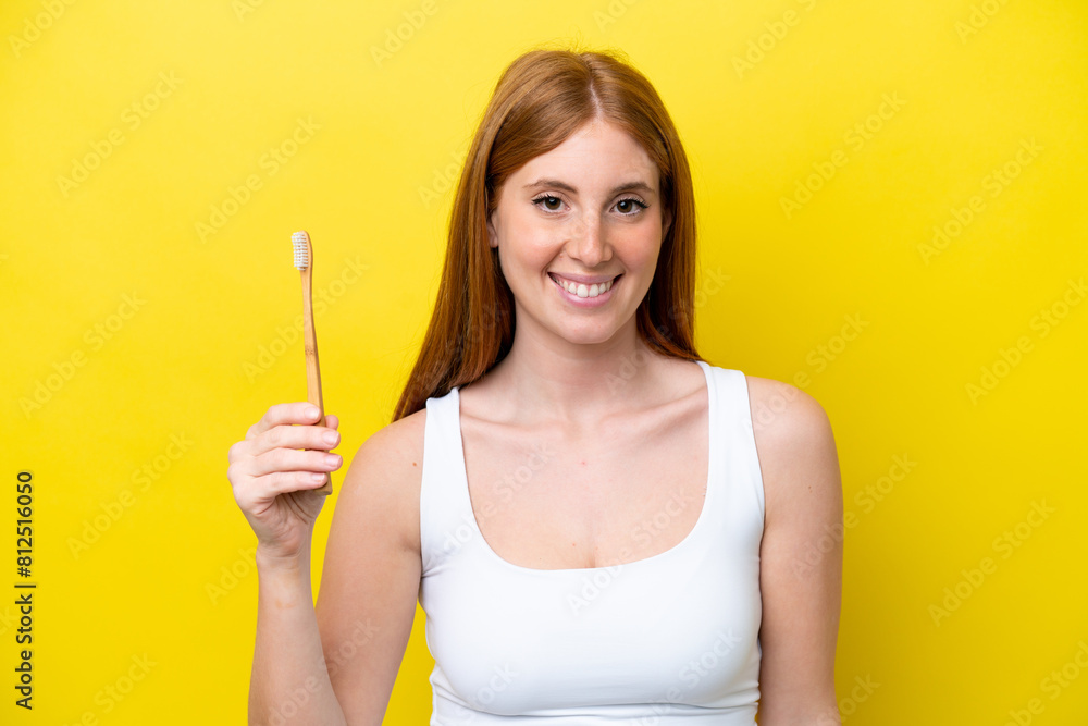 Young redhead woman brushing teeth smiling a lot Young redhead woman brushing teeth smiling a lot