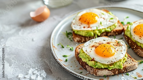 Fresh Avocado: A Vibrant Display on a Green and White Background 