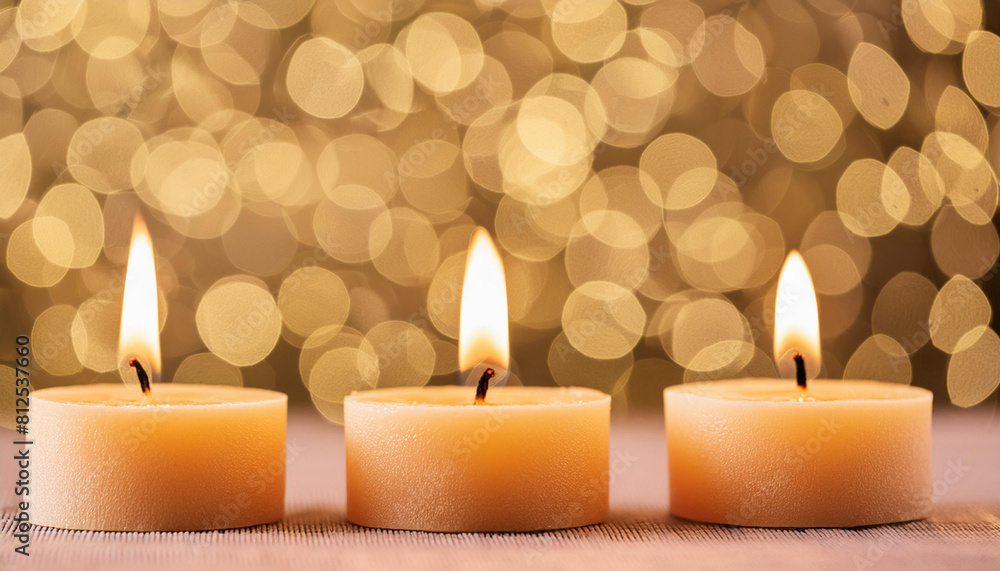 closeup of burning candles on abstract black background, contemplate celebration mood with blurry closeup of burning candles on abstract black background, contemplate celebration mood with blurry