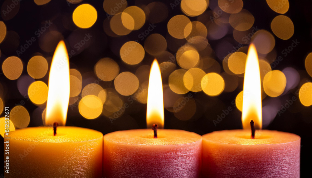 closeup of burning candles on abstract black background, contemplate celebration mood with blurry closeup of burning candles on abstract black background, contemplate celebration mood with blurry