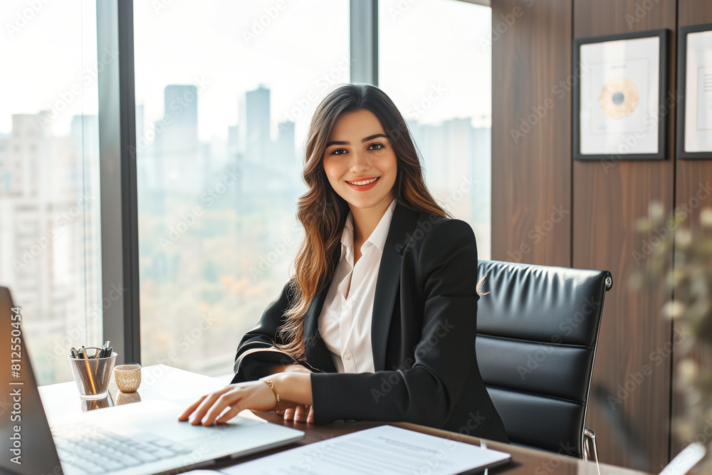 Portrait of a beautiful business woman in the office Portrait of a beautiful business woman in the office