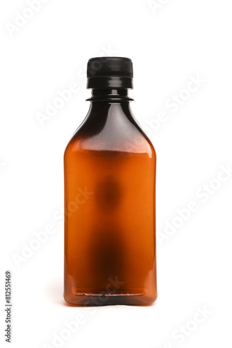Brown bottle with the liquid isolated on the white background. Front view.