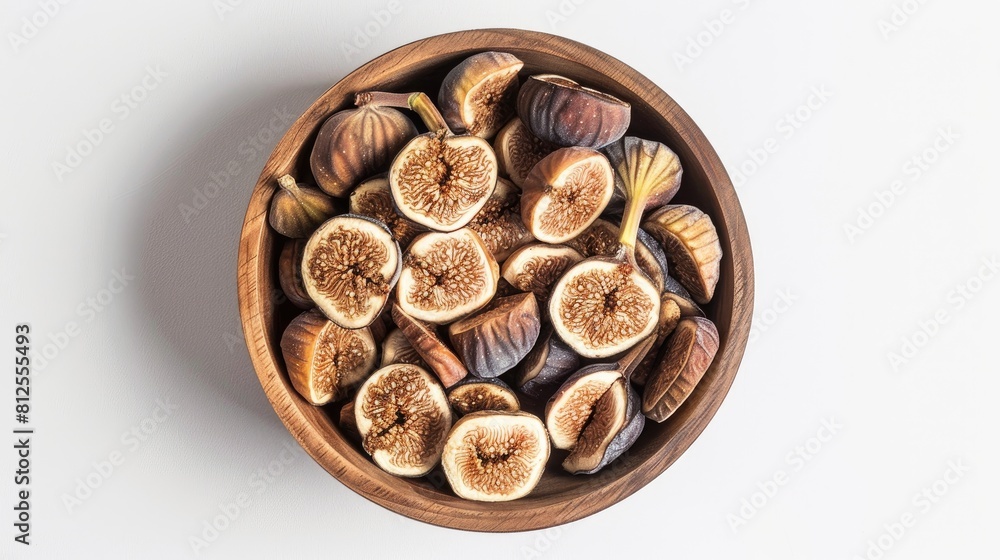 Dried figs in a wooden bowl on a white background Top view Dried figs in a wooden bowl on a white background Top view