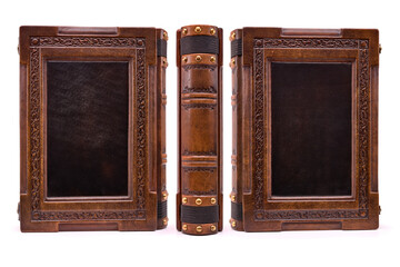 Large brown leather book captured isolated