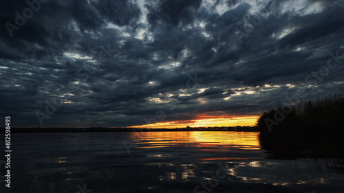 Dramatic beautiful sunset over the water