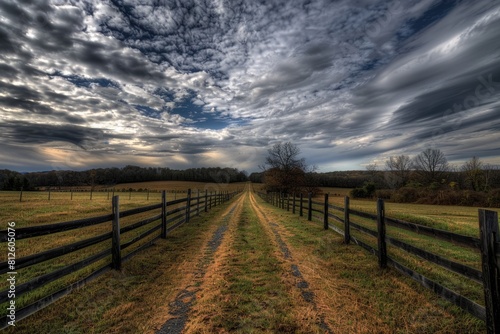 Welcome to Fauquier County, Virginia: A Serene Landscape with Wooden Sign, Fence, and Fluffy Clouds