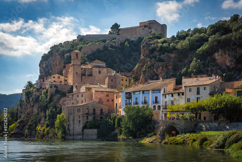 View of the beautiful village of Miravet with the castle in a sunny day, Tarragona, Catalonia, Spain photo