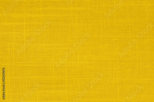 Yellow linen fabric cloth texture for background, natural textile pattern.