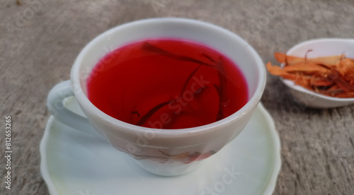 herbal drink made from secang wood, Traditional Red Herbal Drink photo