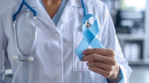 Doctor Holding Blue Awareness Ribbon