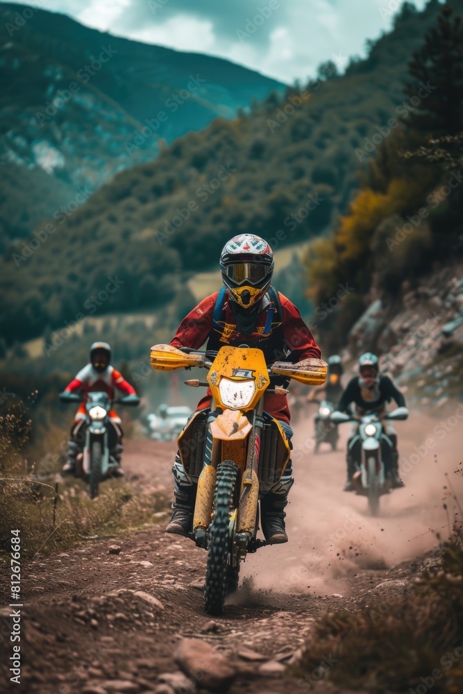 Group of motorcyclists riding down a dirt road, suitable for adventure or travel concepts