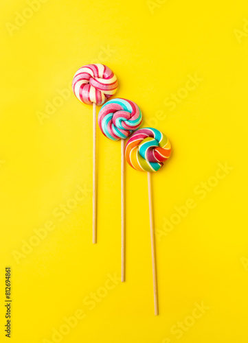 Color lollipop, spiral candy on stick, colorful striped lollypop, round fruit caramel, circle lollipop