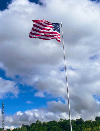 american flag against blue sky