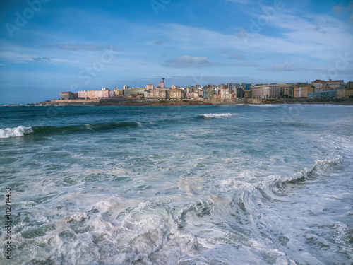 A Coruña facing the sea and big waves reaching Orzan beach