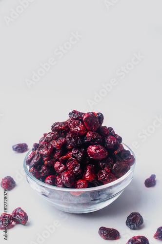 Dried cranberry on white background close up