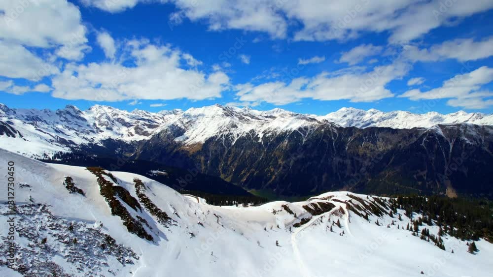 Jaufenpass - South Tyrol - backward flight aerial view of the snowy mountains at the pass at an altitude of 2000 meters Jaufenpass - South Tyrol - backward flight aerial view of the snowy mountains at the pass at an altitude of 2000 meters