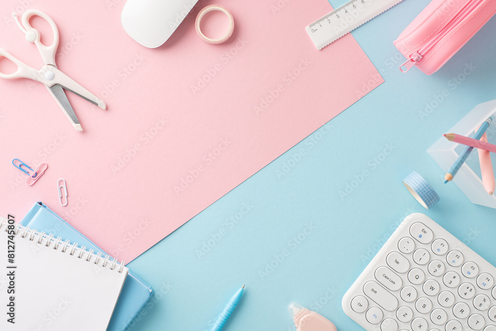 Back to school concept. Overhead view photo of stylish office supplies on pastel pink and blue colored backdrop with space for message Back to school concept. Overhead view photo of stylish office supplies on pastel pink and blue colored backdrop with space for message