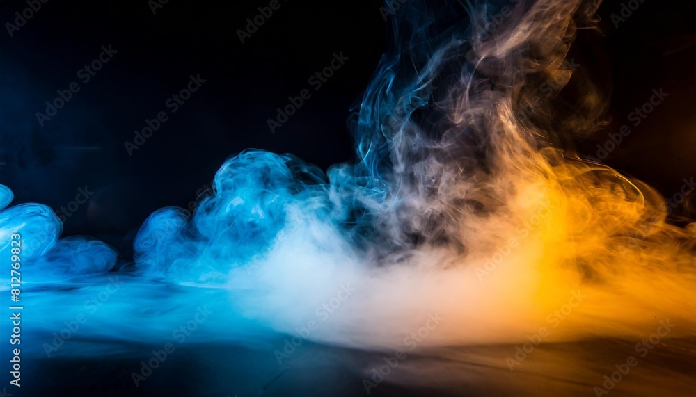 abstract blue and orange smoke steam moves on a black background fog texture