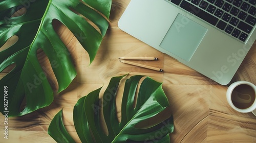 Flat lay top view office table desk Workspace with laptopoffice supplies pencil green leaf and coffee cup on wood background : Generative AI photo