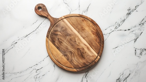 Round empty wooden charcuterie serving board with handle on a white or gray marble table top view Kitchenware template with copy space Flat lay design mockup Layout cooking concept fra : Generative AI photo