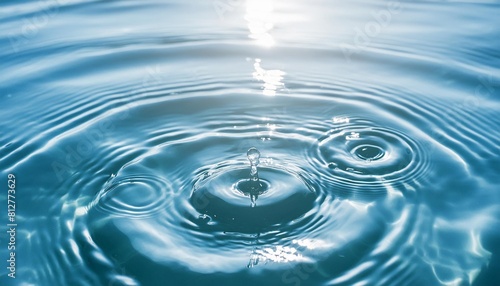 bluewater waves on the surface ripples blurred defocus blurred transparent blue colored clear calm water surface texture with splash and bubbles water waves with shining pattern texture background