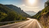 road in mountains kalabaka region meteora greece empty asphalt road with glowing perfect sky and sunlight landscape with beautiful winding mountain road with a perfect asphalt in the evening