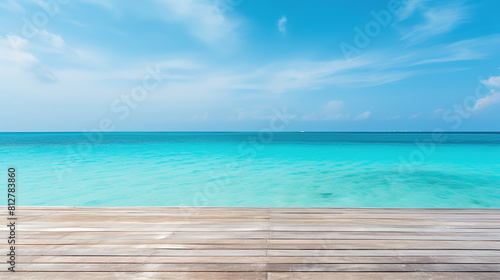 Wooden Dock in Warm Sunlight Overlooking Calm Blue Ocean