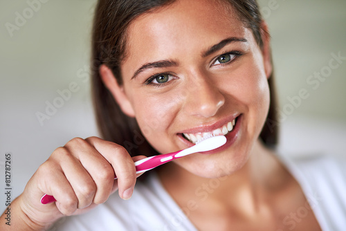 Portrait  woman and smile with toothbrush in home for hygiene and clean teeth. Female person  face and happy with toothpaste for fresh breath or smell with oral or dental health and gum treatment