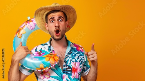 Young surprised tourist man in beach shirt hat hold inflatable ring point index finger aside on workspace isolated on plain orange background studio portrait Summer vacation sea rest s : Generative AI photo