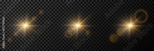 A collection of bright light effects and glare, sparkling stars, and flares. On a transparent background.