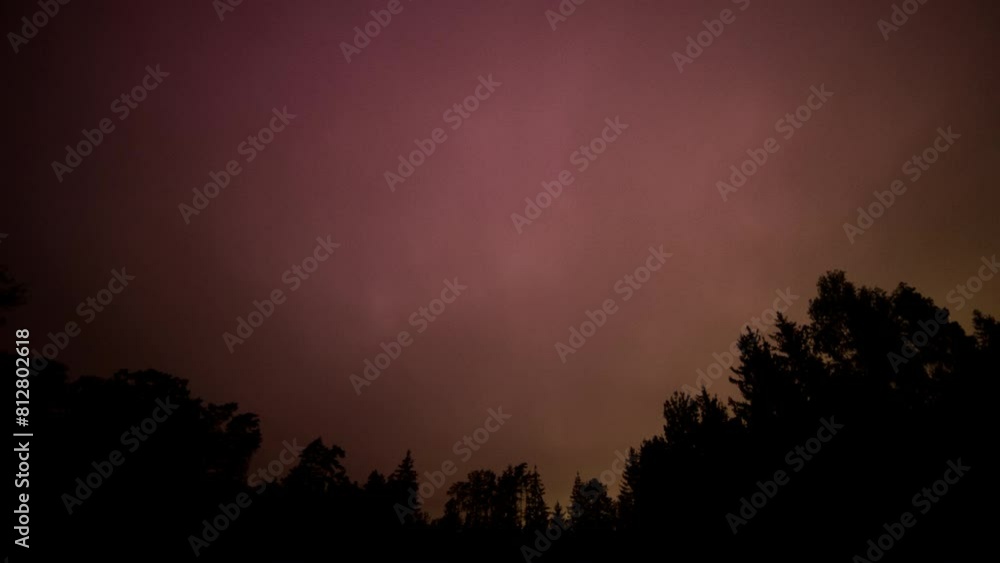 Cloudy sky with northern lights, geomagnetic storm over Poland. Cloudy sky with northern lights, geomagnetic storm over Poland.