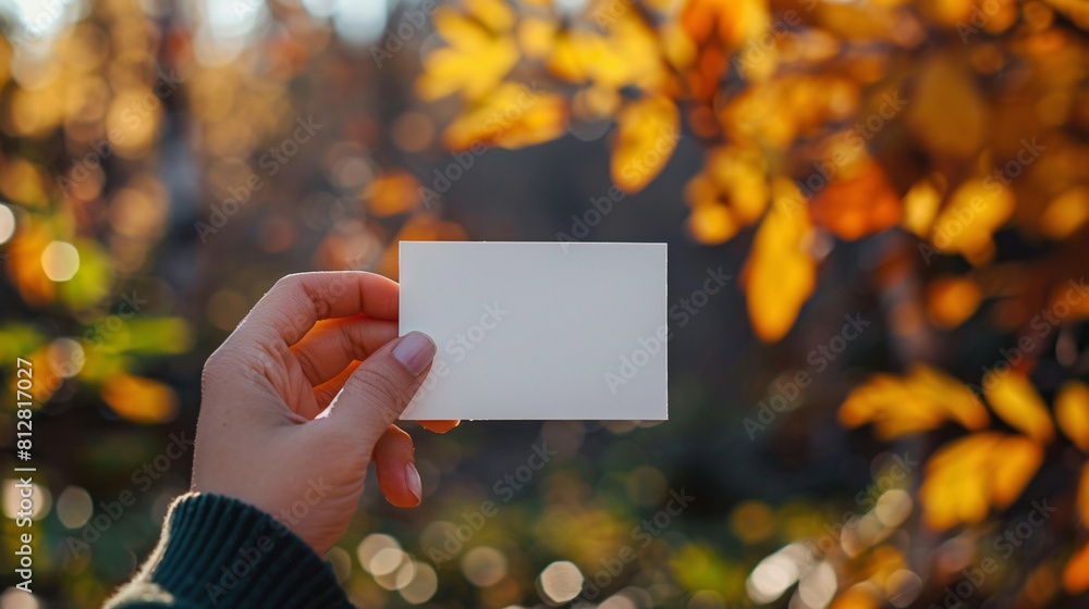 Autumn Scene with Hand-Holding Paper Sign Autumn Scene with Hand-Holding Paper Sign