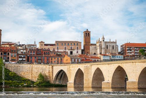 Panorama view of the medieval bridge and city of Tordesillas in Valladolid by the Douro River.
