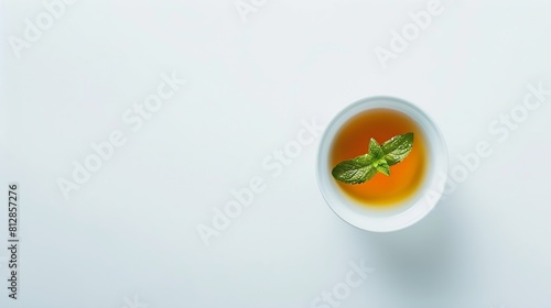 Creative layout made of cup of herbal tea on a white background Top view : Generative AI