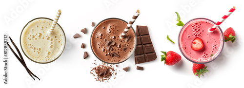 Set of fresh various delicious milkshakes or smoothies, top vies, isolated on white background. Strawberry, vanilla and chocolate flavor
