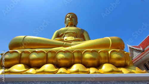 Big Golden Buddha Dhammakaya Tep Mongkol Buddha at Paknam Bhasicharoen temple or Wat Paknam Bhasicharoen in Bangkok Thailand - Landmark Famous sculpture statue in Thailand Temple photo