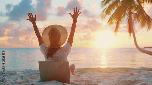 Work from anywhere Rear view of young woman female freelancer in straw hat working on laptop keeping arms raised and cellebrating success while sitting on the tropical sandy beach at s : Generative AI photo