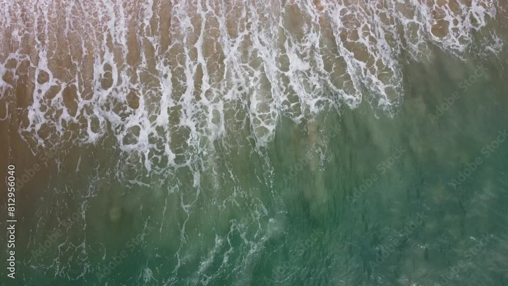 Peaceful Aerial Scene of Waves Meeting a Sandy Beach Peaceful Aerial Scene of Waves Meeting a Sandy Beach