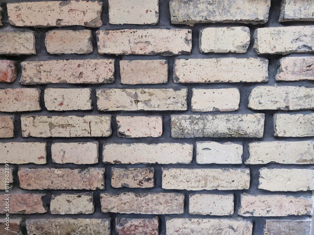 Obraz premium Ceglana , murowana ściana budynku loftowego, industrialna architektura